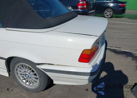 1999 BMW 323Ic z USA, uszkodzony, nr VIN WBABJ7334XEA17837